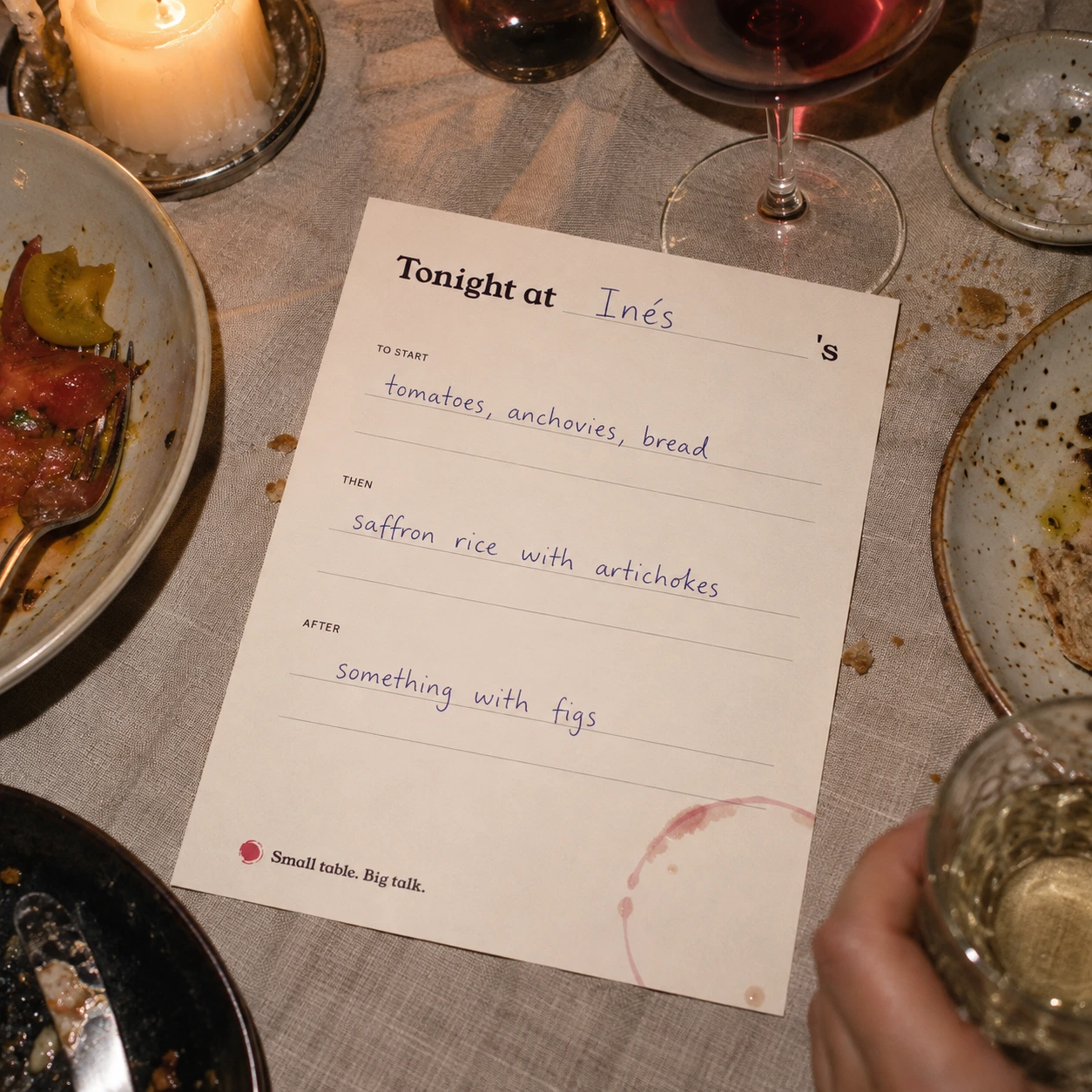 A Paladar dinner menu on the table, filled in by hand: Tonight at Inés's.