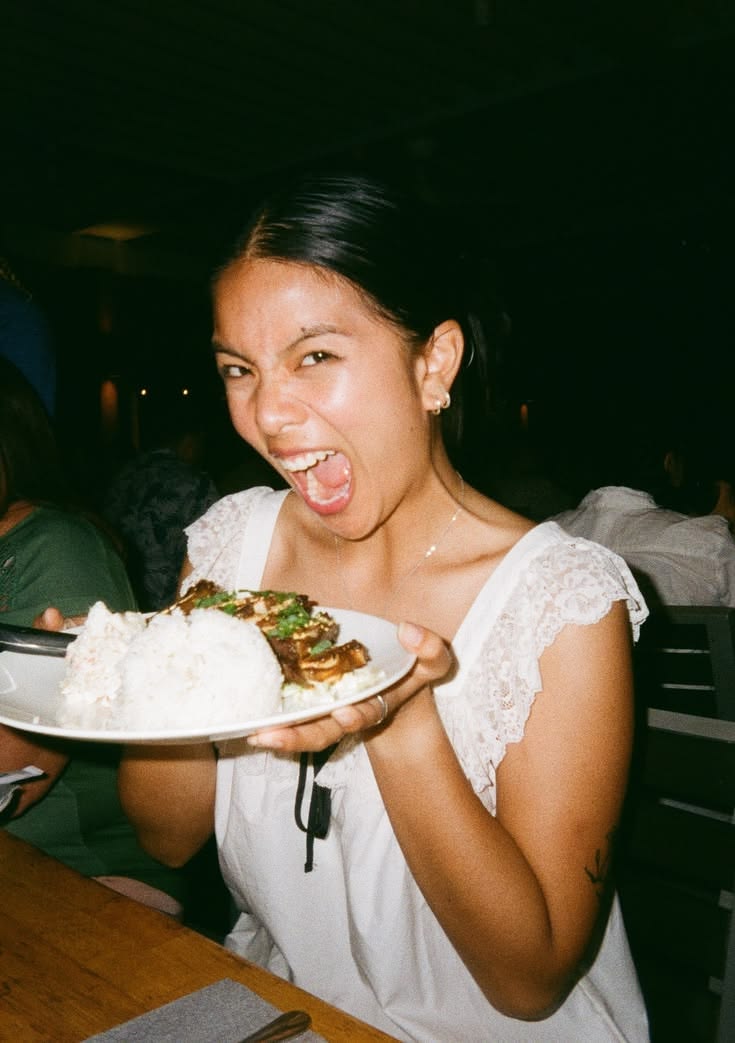A guest talking at dinner.